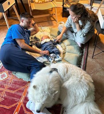 Mia Golob and Andraz Sporar with their son Julijan and their puppy Lucky